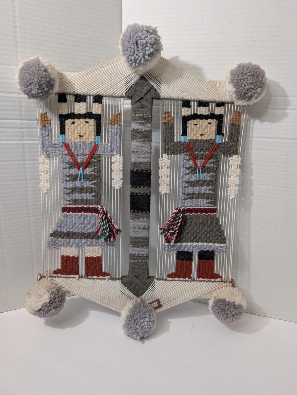 Handwoven Yei Bi Chei Navajo Style Wall Hanging with Large Gray Pom Poms